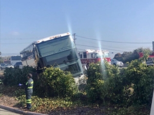 No injuries after bus ends up in ditch along Highway 101