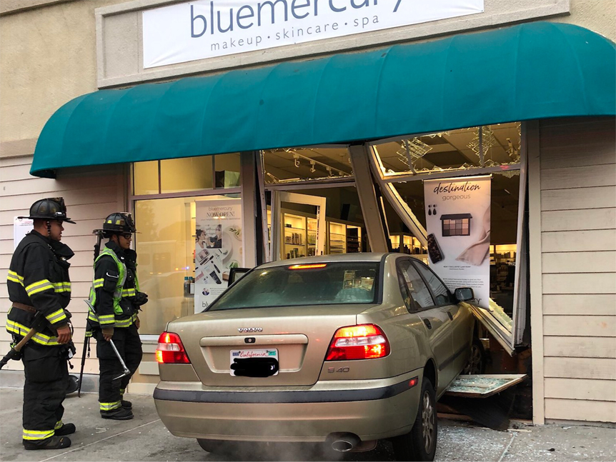 Car crashes into business at Sequoia Station