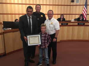 Redwood City boy praised for response to fire in his neighborhood